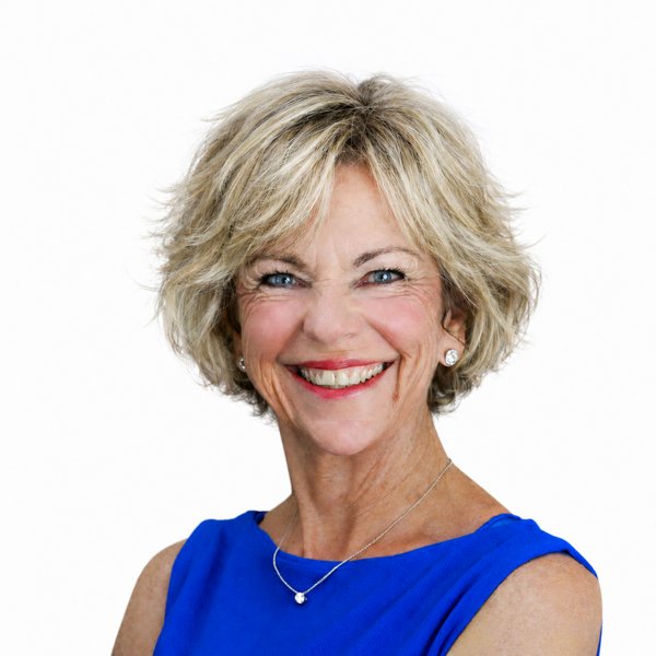 Amanda Gore smiling, in a blue top