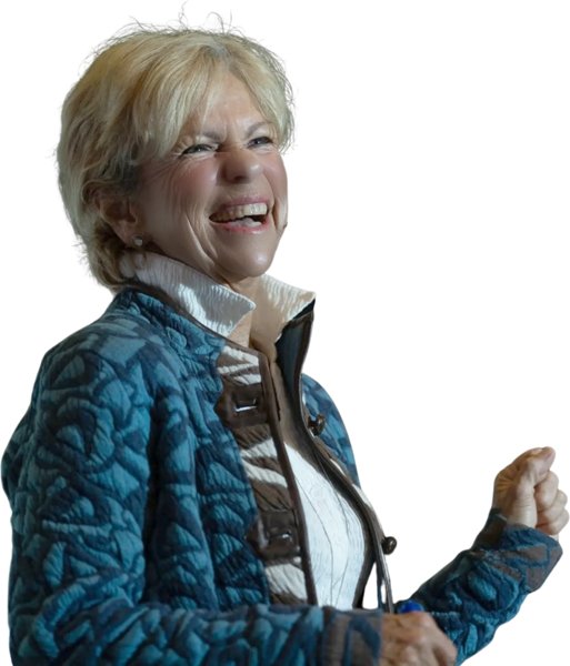 Amanda Gore laughing, in a blue quilted jacket